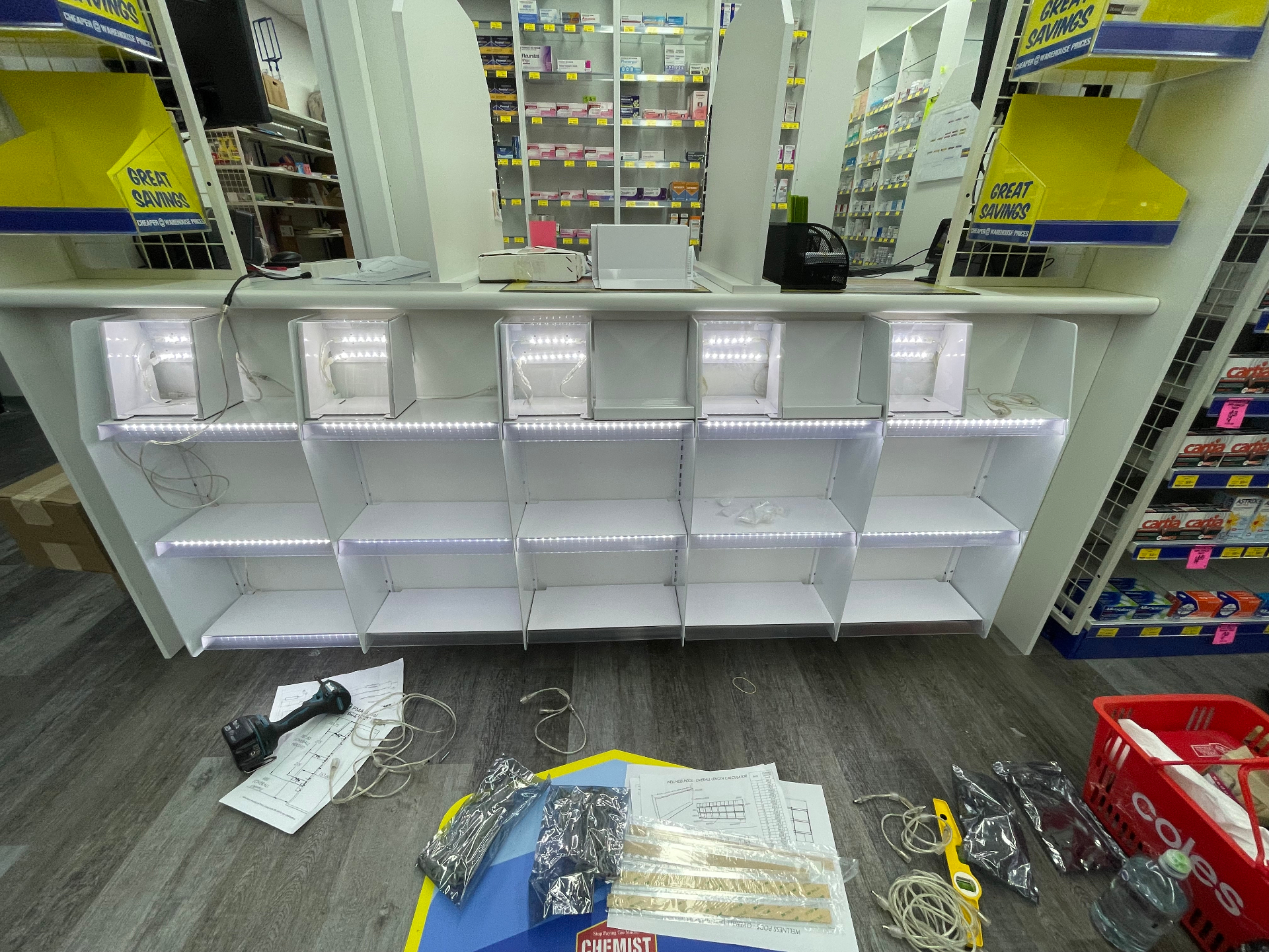 LED-lit wellness pod display bays wired and tested