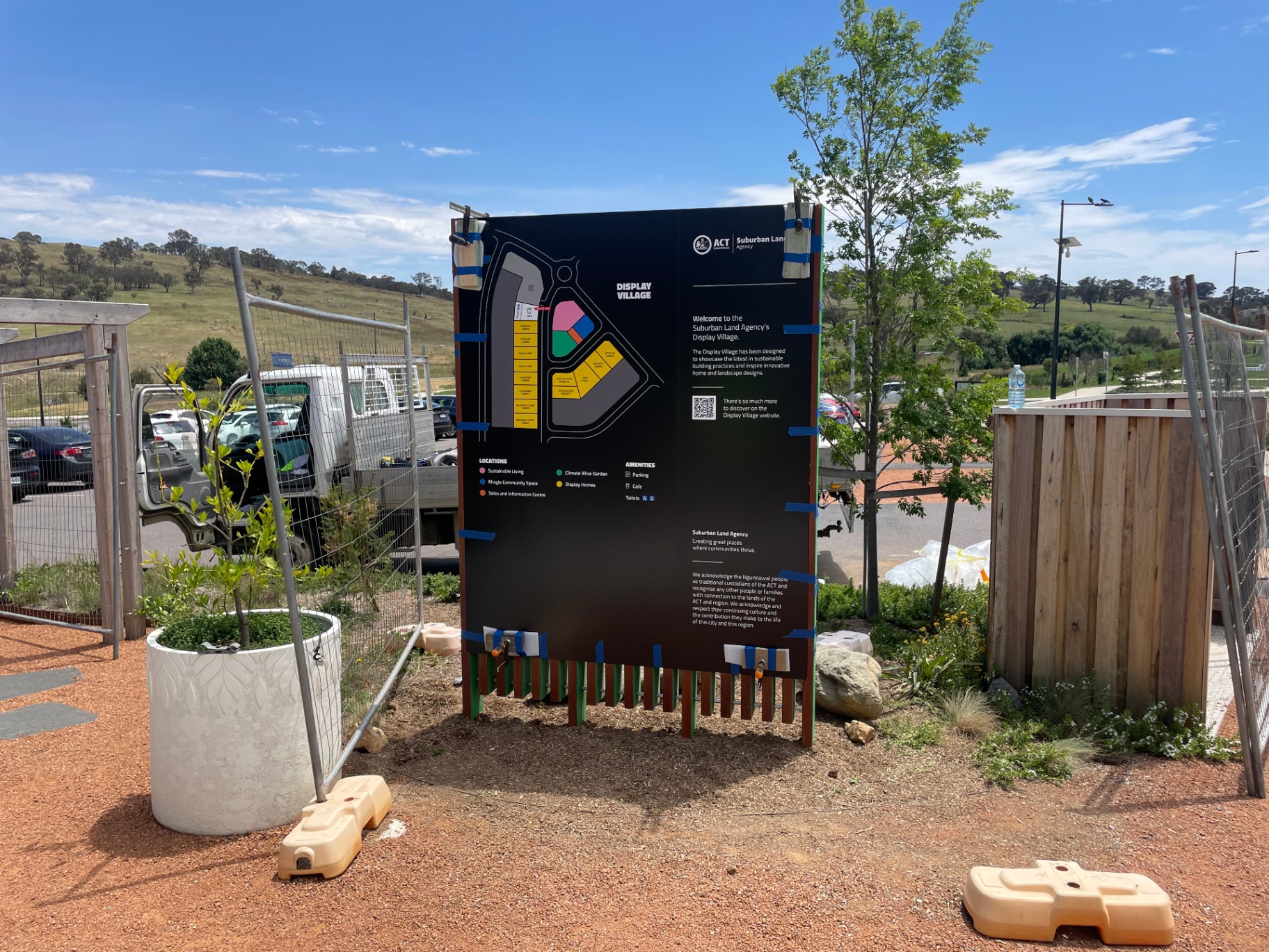 Completed ACT Government information sign in landscaped setting