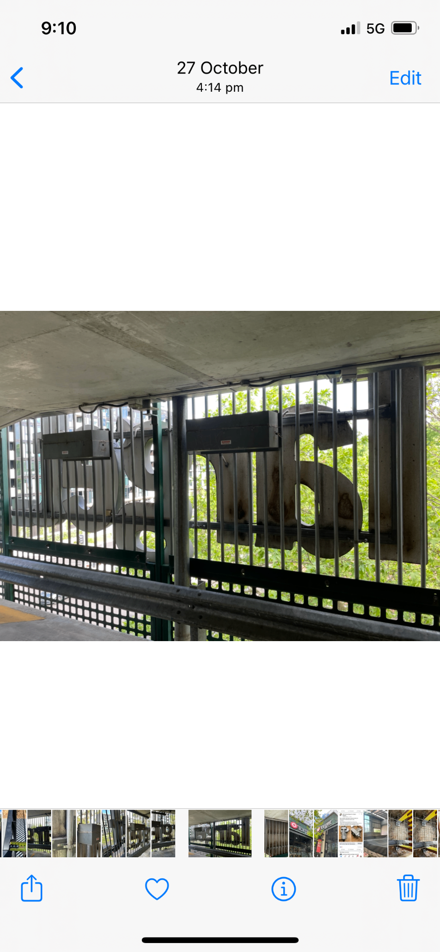 Rear access view of the letter faces and power boxes behind the screen