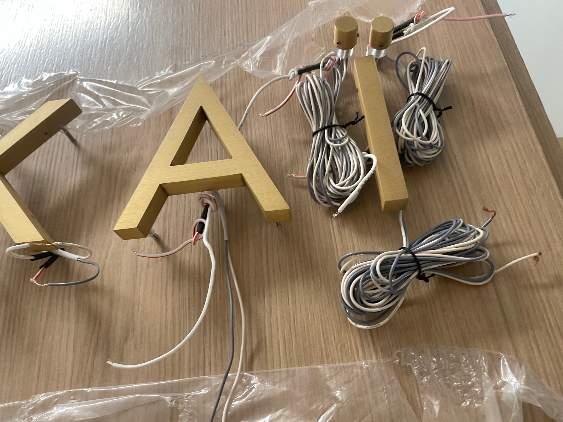 Bench-tested brass letters & LED harness