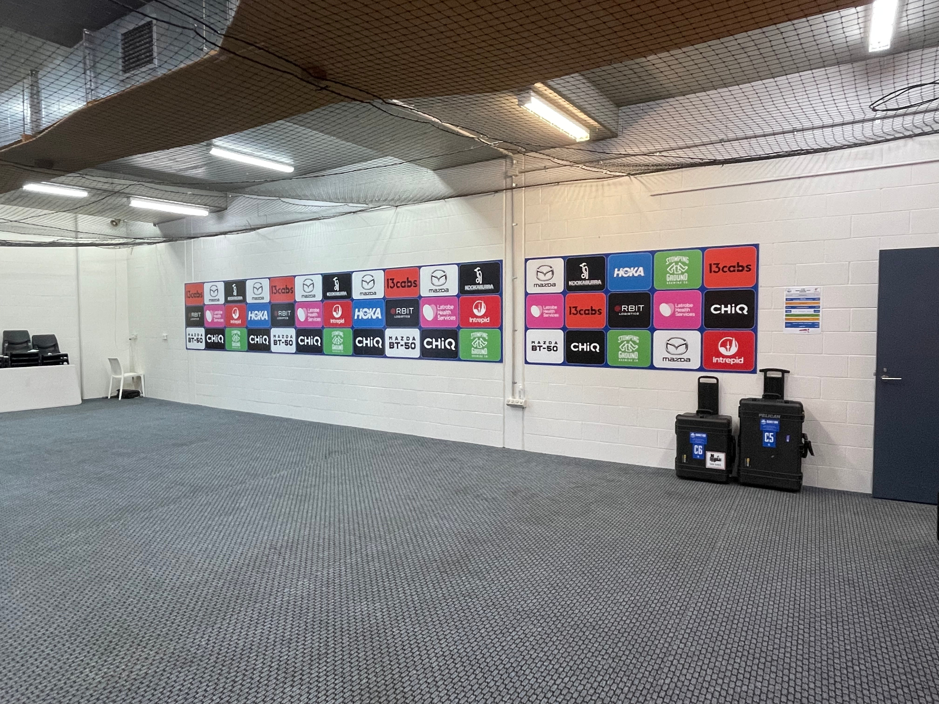 Wraparound sponsor run through corridor with laser-aligned panels