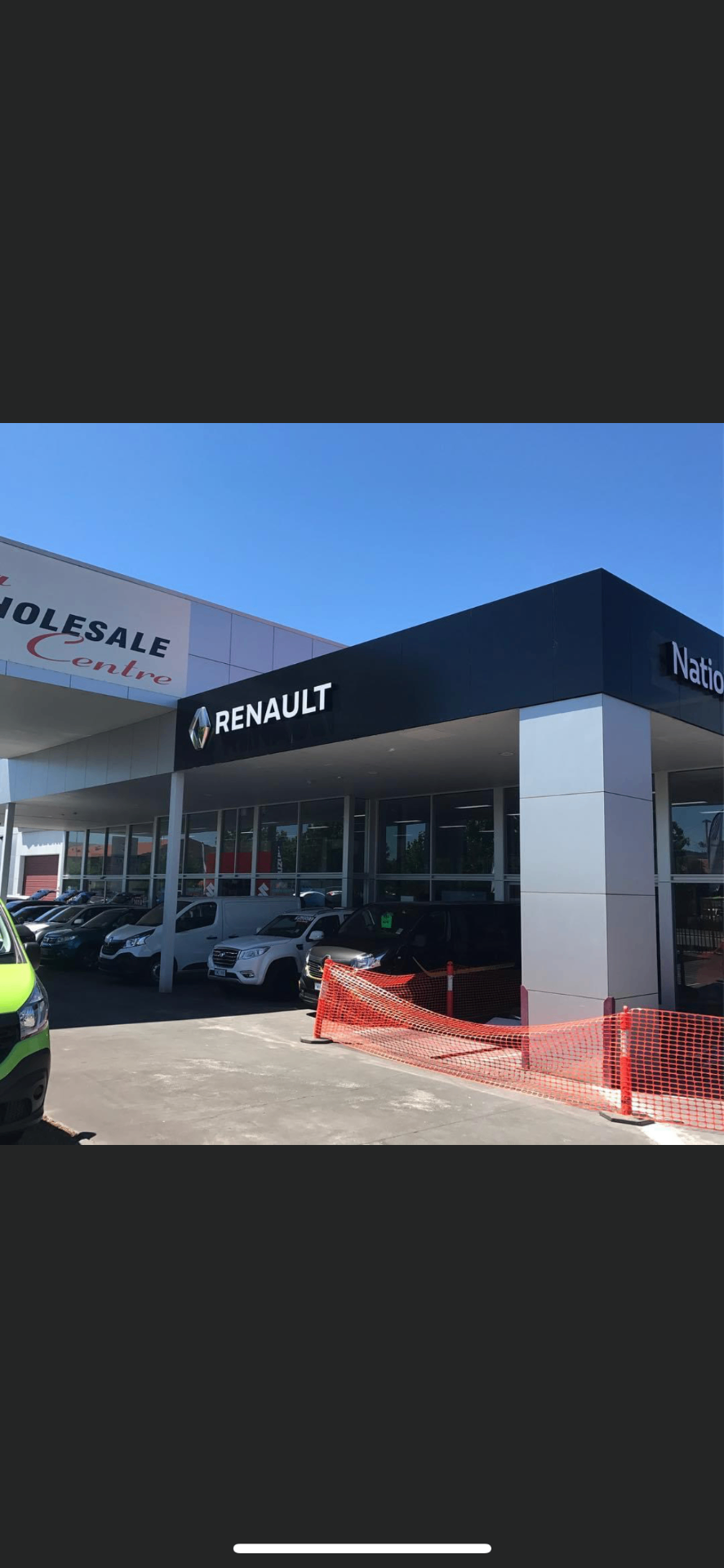 Finished dealership entry with new brand fascia in place