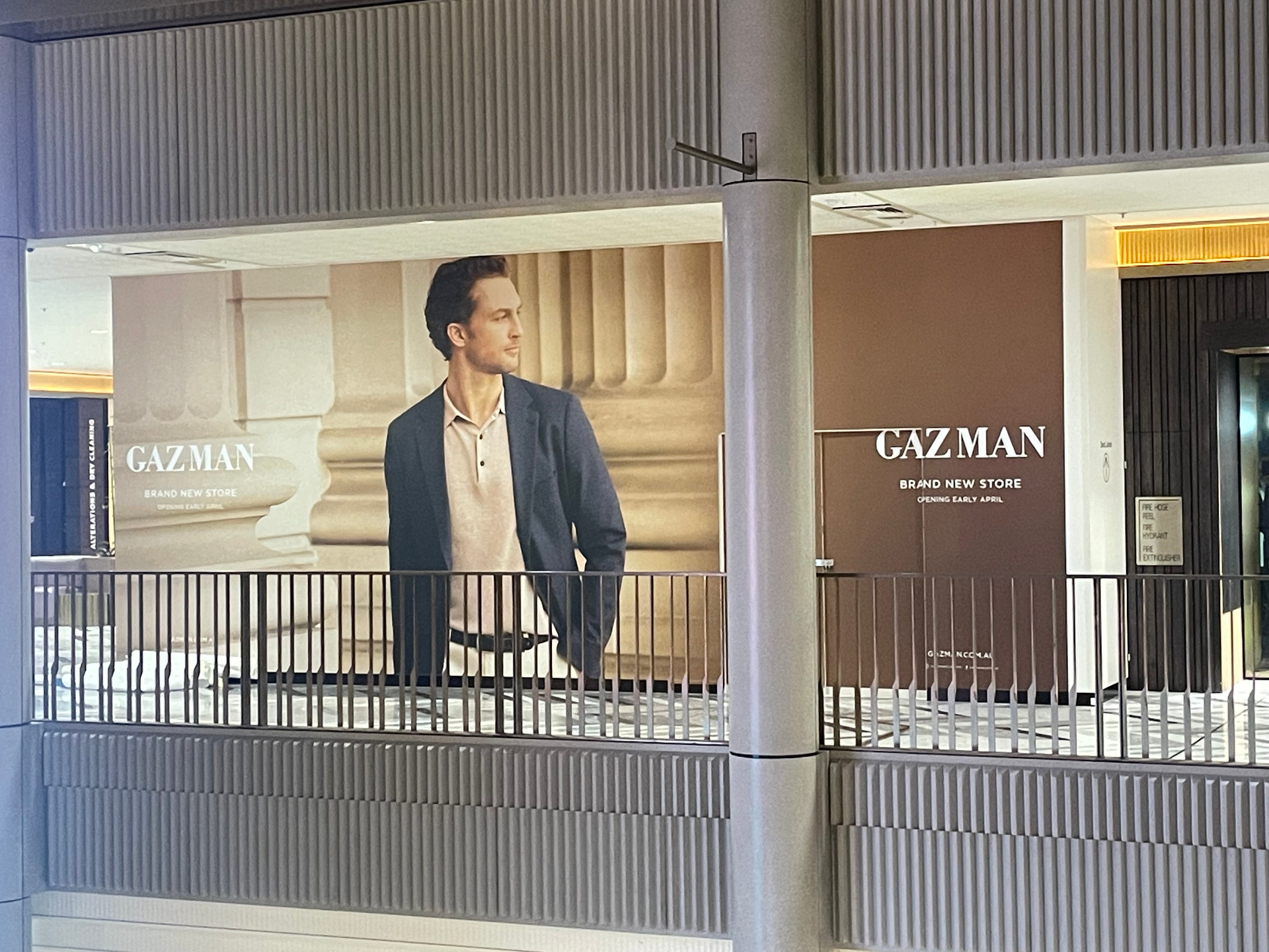 Upper-level shopfront view from mall