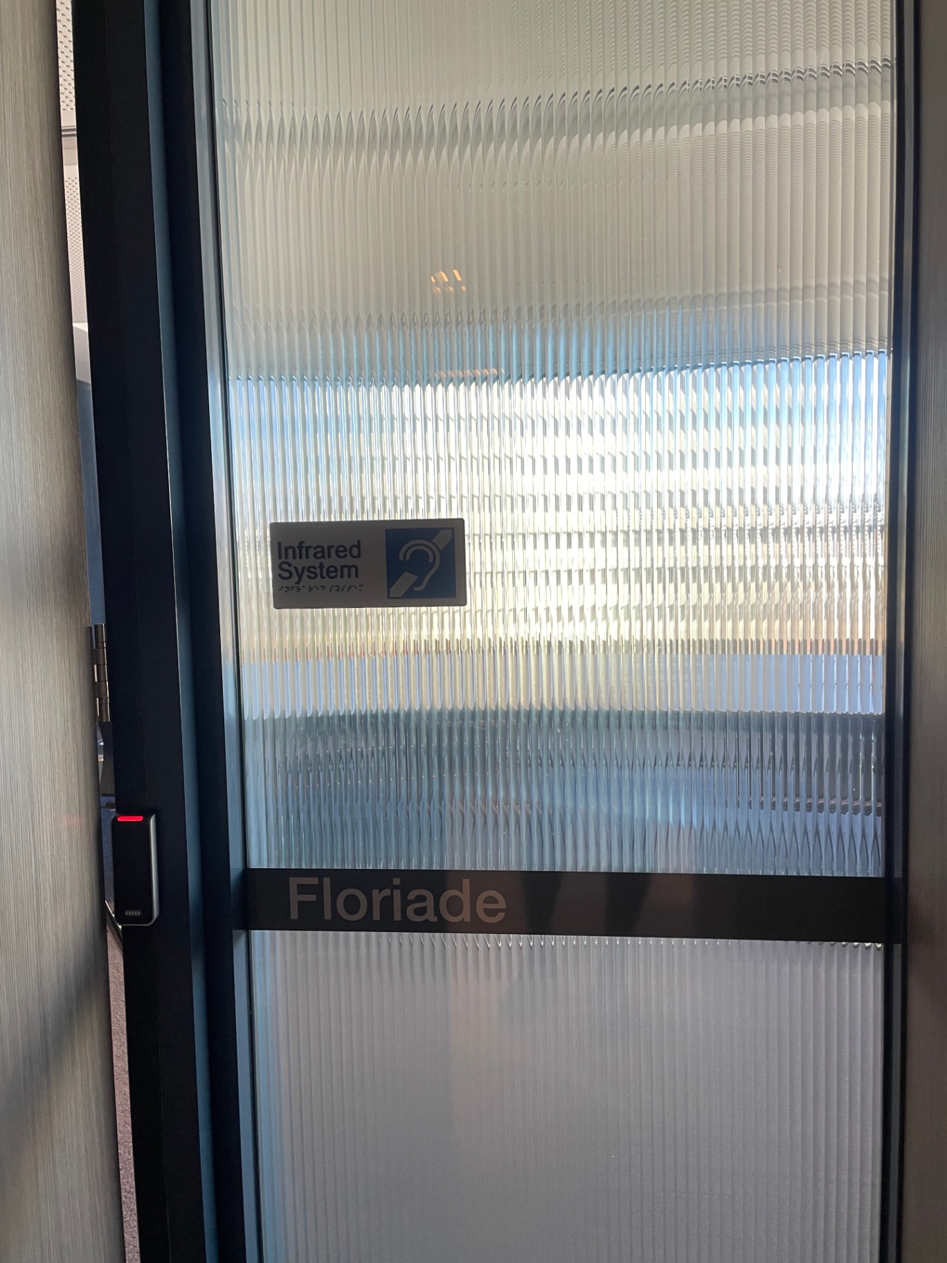 Floriade room identification on fluted glass