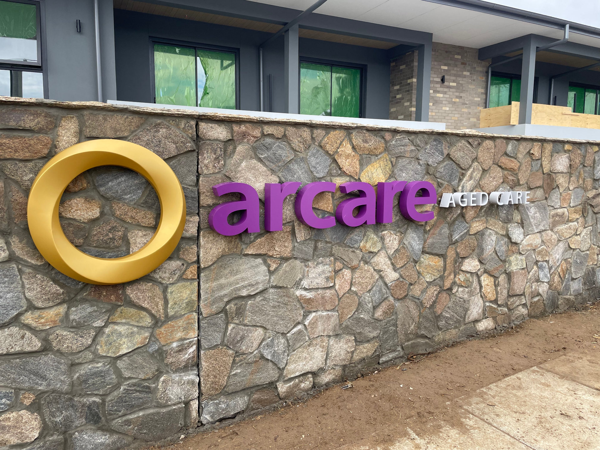 Completed Arcare Aged Care facade sign