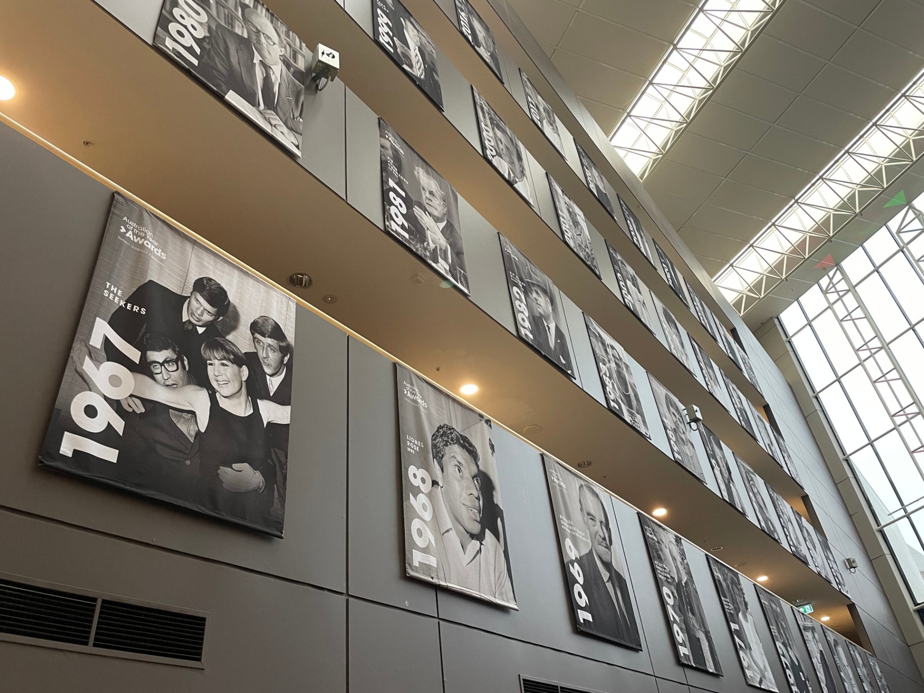 Low-angle detail across the multi-storey banner display